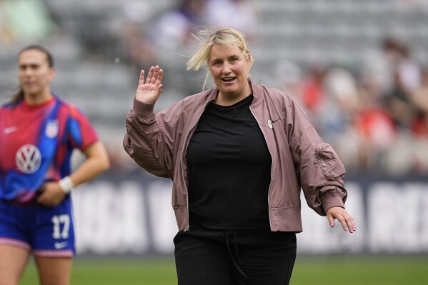 United States women's national team head coach Emma Hayes waves to fans before facing South Korea in an international friendly soccer game, Saturday, June 1, 2024, in Dick's Sporting Goods Park in Commerce City, Colo. (AP Photo/David Zalubowski)