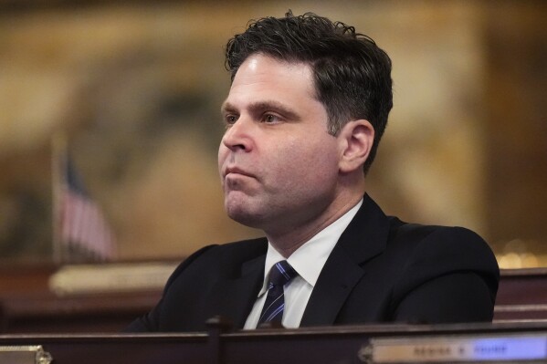 FILE - Pennsylvania state House of Representatives' impeachment manager Rep. Jared Solomon, listens to remark before he and other managers deliver articles of impeachment against Philadelphia's Democratic district attorney, Larry Krasner, to the Senate chamber at the Pennsylvania Capitol in Harrisburg, Pa., Wednesday, Nov. 30, 2022. Solomon said Tuesday, Sept. 12, 2023, that he will run in next year’s election for Pennsylvania attorney general, an office that has played a big role in fighting drug trafficking, suing opioid makers and defending the battleground state’s 2020 presidential election. (AP Photo/Matt Rourke, File)