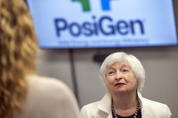 Secretary of the Treasury Janet Yellen listens to staff of PosiGen, a leading solar energy company in Kenner, La., as she hears how people can save money using solar power, Friday, June 30, 2023 in New Orleans. Yellen talked about how the Inflation Reduction Act is helping drive a manufacturing boom and helping lower costs for consumers. (Chris Granger/The Times-Picayune/The New Orleans Advocate via AP)