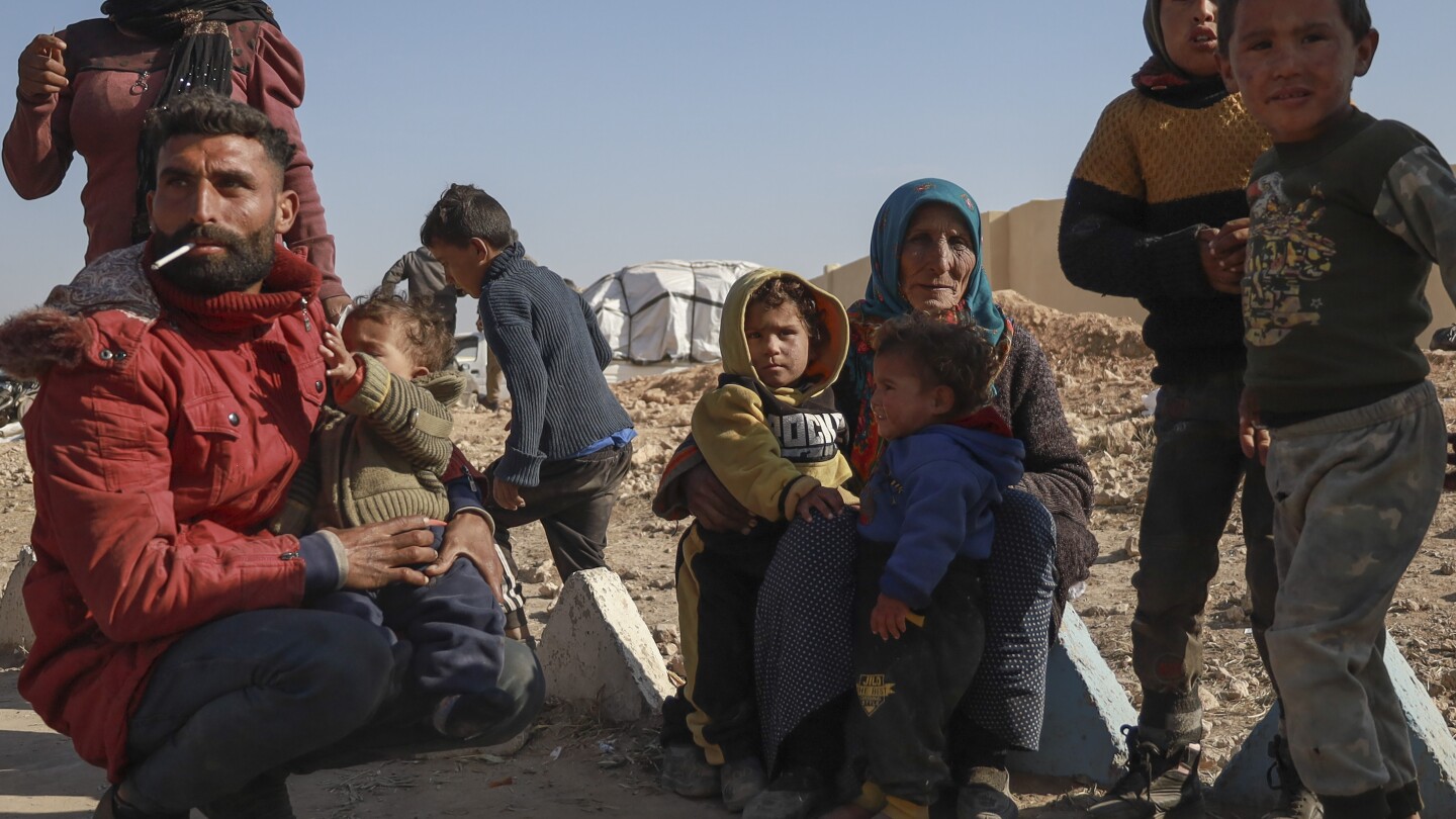 Syrian insurgents seize central town of Hama in some other blow to Syrian president