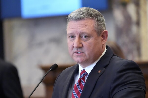 Mississippi Senate Education Committee Chairman Sen. Dennis DeBar, R-Leakesville, discusses legislation that makes changes to the Mississippi Adequate Education Program (MAEP) in the Senate chamber, Thursday, March 7, 2024, at the Mississippi Capitol in Jackson. (AP Photo/Rogelio V. Solis)