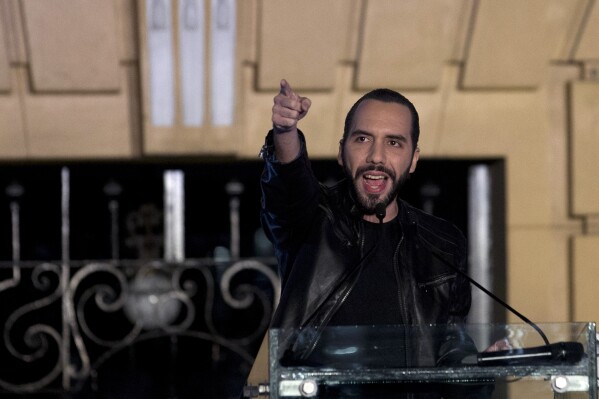 FILE- Newly-elected president of El Salvador Nayib Bukele addresses his supporters, in San Salvador, El Salvador on Feb. 3, 2019. Bukele was officially nominated by his New Ideas party Sunday, July 9, 2023, to run for reelection next year, brushing aside objections from legal experts and opposition figures who say El Salvador’s constitution prohibits his candidacy. (AP Photo/Moises Castillo, File)