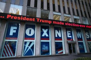 FILE - A headline about President Donald Trump is displayed outside Fox News studios, on Nov. 28, 2018, in New York. On Thursday, Feb. 16, the voting machine company Dominion filed court papers documenting that numerous Fox News personalities knew there was no evidence to support the claims peddled by Trump's allies, but aired them anyway on the nation's most-watched cable network. (AP Photo/Mark Lennihan, File)