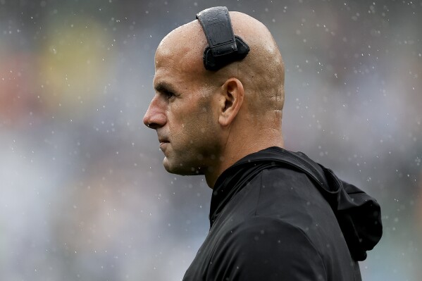 New York Jets head coach Robert Saleh watches play from the sidelines between the New York Jets and the New England Patriots of an NFL football game, Sunday, Sept. 24, 2023, in East Rutherford, N.J. (AP Photo/Adam Hunger)
