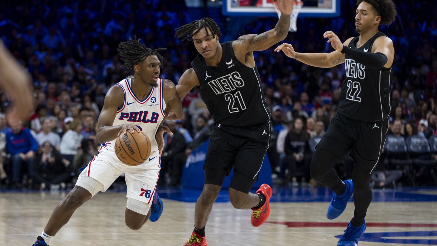 Joel Embiid sits out as 76ers zip past Nets 107-86. Philly will