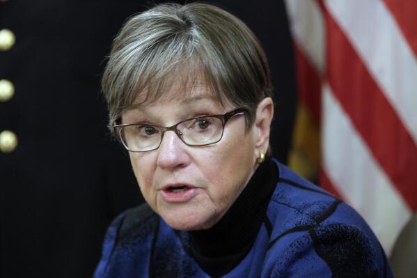 Kansas Gov. Laura Kelly speaks during an event at the Kansas Statehouse in Topeka, Kan., Thursday, March 24, 2022. The Democratic governor has vetoed a Republican measure to ban transgender athletes from girls' and women's sports and a GOP measure aimed at making it easier for parents to try to remove materials from public school classrooms and libraries. (AP Photo/John Hanna)