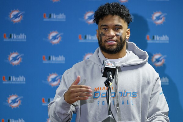 Miami Dolphins quarterback Tua Tagovailoa answers questions during a news conference after playing against the New York Jets in an NFL football game, Friday, Nov. 24, 2023, in East Rutherford, N.J. (AP Photo/Noah K. Murray)