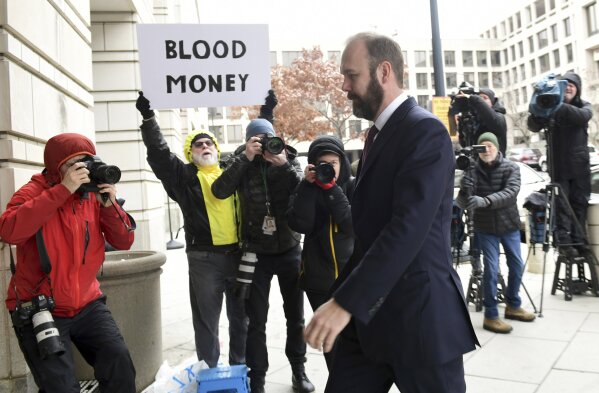 
              Rick Gates arrives at federal court in Washington, Friday, Feb. 23, 2018. Gates, a former top adviser to President Donald Trump's campaign is scheduled to plead guilty in the special counsel's Russia investigation to federal conspiracy and false statements charges. (AP Photo/Susan Walsh)
            