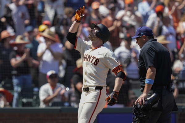 Reds acquire outfielder Austin Slater from Giants for left-handed reliever  Alex Young | AP News