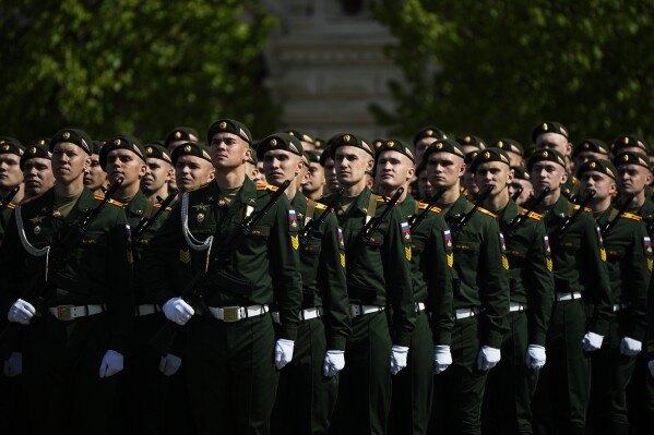 Russian servicemen stand in formation in Red Square during the Victory Day military parade in Moscow, Russia, Friday, May 9, 2025, during celebrations of the 80th anniversary of the Soviet Union's victory over Nazi Germany during the World War II. (AP Photo/Pavel Bednyakov, Pool)