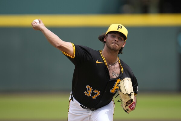 Pittsburgh Pirates starting pitcher Jared Jones throws during the first inning of a spring training baseball game against the Toronto Blue Jays Tuesday, March 5, 2024, in Bradenton, Fla. (AP Photo/Charlie Neibergall)