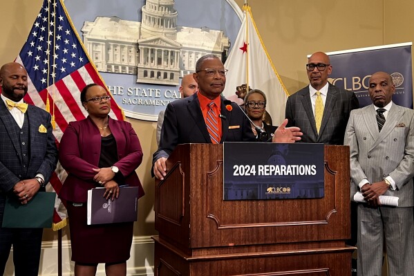 Assemblymember Reggie Jones-Sawyer, D-Los Angeles, speaks about a package of reparations legislation at a press conference at the state Capitol on Wednesday, Feb. 21, 2024. (APPhoto/Sophie Austin)