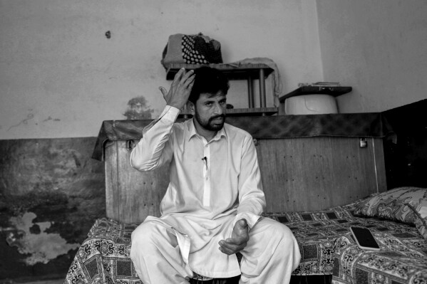 Imran Iqbal, who survived a failed attempt to reach Spain by boat, tells his story during an interview with The Associated Press in Gajju, a village in Gujrat district, Pakistan, April 16, 2025. (AP Photo/Anjum Naveed)