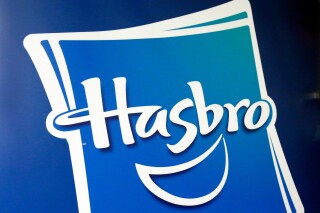FILE - The Hasbro logo is seen, April 26, 2018, in New York. Toy maker Hasbro said Monday, Dec. 11, 2023, that it is cutting about 1,100 jobs, or 20% of its workforce, as the malaise in the toy business extends through another holiday shopping season. (AP Photo/Richard Drew, File)