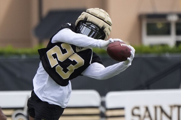 New Orleans Saints cornerback Marshon Lattimore runs through drills during the team's NFL football minicamp in Metairie, La., Wednesday, June 12, 2024. (AP Photo/Gerald Herbert)