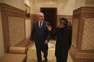 
              This photo posted on Twitter by Israeli Prime Minister Benjamin Netanyahu’s office on Friday, Oct. 26, 2018 shows Netanyahu visiting Sultan Qaboos bin Said in Oman. Israel and Oman do not have diplomatic relations. The meeting was the first between leaders of the two countries since 1996 and former Israeli premier Yitzhak Rabin made a similar surprise visit to Oman two years earlier. (Israeli Prime Minister's Office via AP)
            