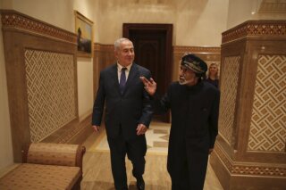This photo posted on Twitter by Israeli Prime Minister Benjamin Netanyahu’s office on Friday, Oct. 26, 2018 shows Netanyahu visiting Sultan Qaboos bin Said in Oman. Israel and Oman do not have diplomatic relations. The meeting was the first between leaders of the two countries since 1996 and former Israeli premier Yitzhak Rabin made a similar surprise visit to Oman two years earlier. (Israeli Prime Minister's Office via AP)