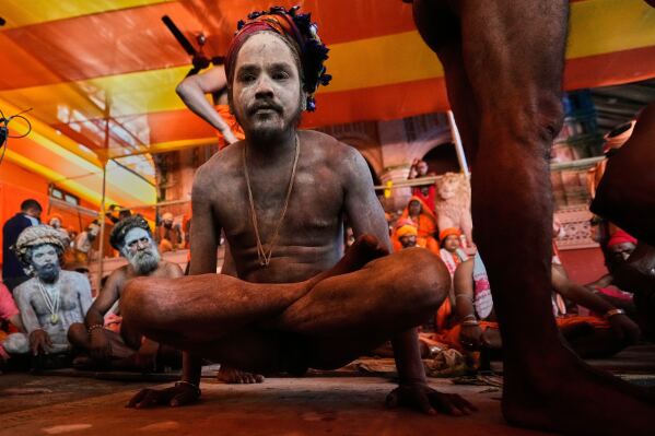 A Hindu holy man displays yoga skills on International Day of Yoga at Kamakhya temple in Guwahati, Saturday, June 21, 2025. (AP Photo/Anupam Nath)