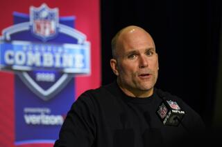 Baltimore Ravens general manager Eric DeCosta speaks during a press conference at the NFL football scouting combine in Indianapolis, Wednesday, March 2, 2022. (AP Photo/Michael Conroy)