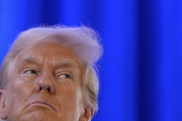 Republican presidential nominee former President Donald Trump listens during an event on combating antisemitism at Trump National Golf Club, Thursday, Aug. 15, 2024, in Bedminster, N.J. (AP Photo/Julia Nikhinson)