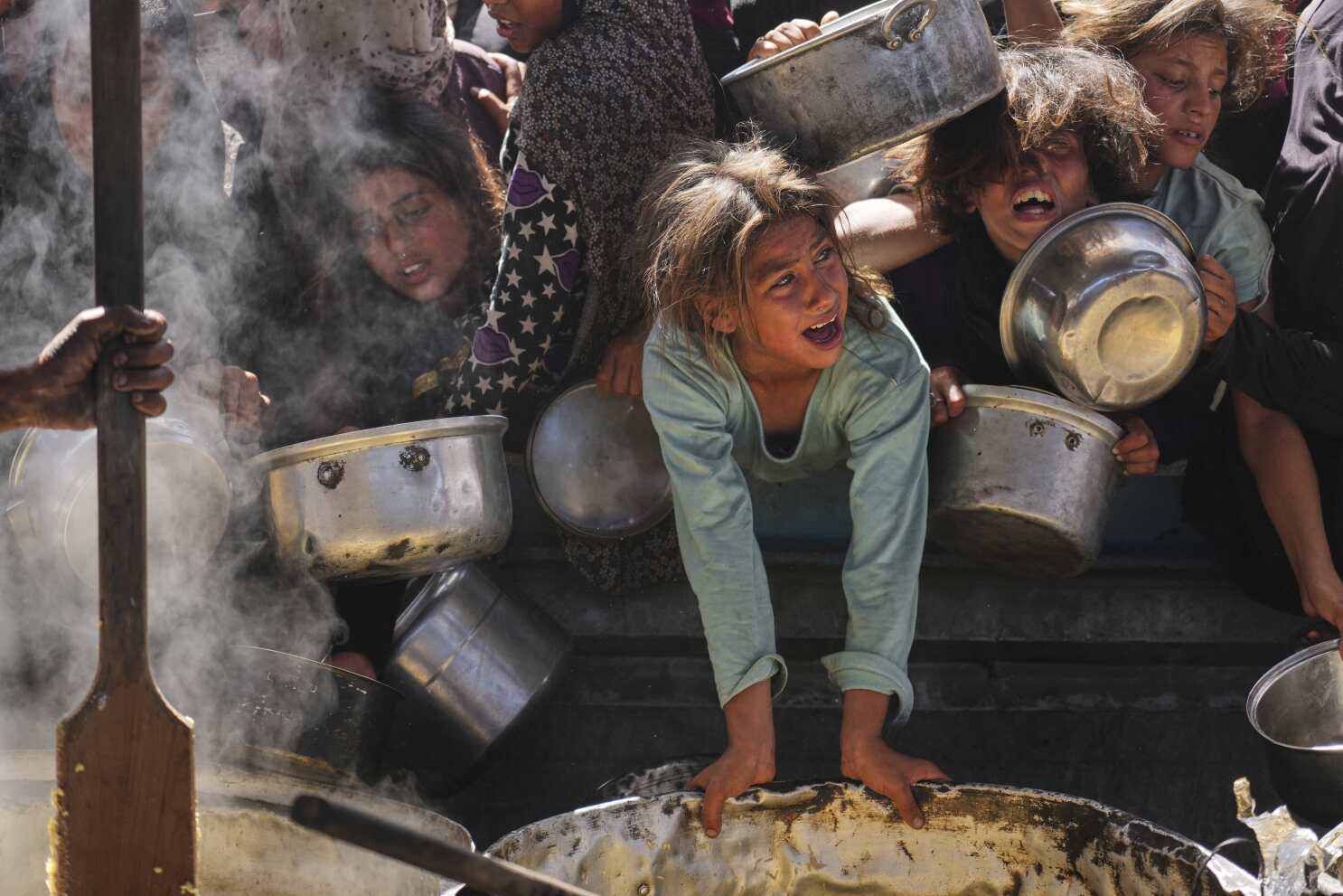 AP PHOTOS: Israeli strikes in Gaza kill more than 100