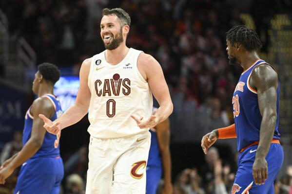 Cleveland Cavaliers forward Kevin Love (0) celebrates after making a 3-point basket during the second half of an NBA basketball game against the New York Knicks, Sunday, Oct. 30, 2022, in Cleveland. (AP Photo/Nick Cammett)