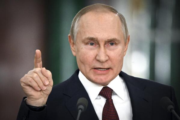 FILE - Russian President Vladimir Putin gestures while speaking at a news conference following a meeting of the State Council at the Kremlin in Moscow, Russia on Dec. 22, 2022. (Sergey Guneyev, Sputnik, Kremlin Pool Photo via AP, File)