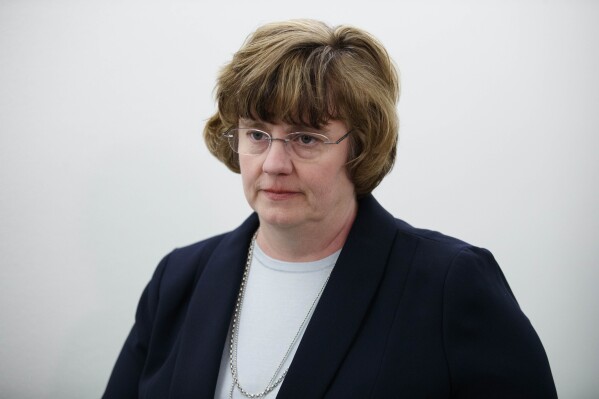 FILE - Phoenix prosecutor Rachel Mitchell returns to a Senate Judiciary Committee hearing after a break on Capitol Hill in Washington, Sept. 27, 2018. Mitchell, the Republican prosecutor of Arizona's most populous county, Maricopa County, took a thinly veiled swipe at a Democratic counterpart in the East on Wednesday, Feb. 21, 2024, saying it would be more secure to hold a man accused of stabbing two women in Arizona than to extradite him to New York City, where he is wanted in connection with the fatal bludgeoning of a woman in a hotel room. (AP Photo/Carolyn Kaster, File)