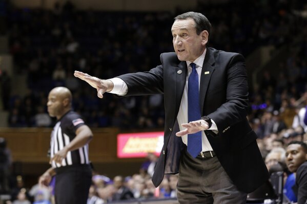 FILE - In this Nov. 12, 2019, file photo, Duke head coach Mike Krzyzewski reacts to a play during an NCAA college basketball in Durham, N.C. “Right now, we’re asking experts to give us guidance -- life and death in some respects,” Krzyzewski said. "People should pay close attention, he said, “or else we’re not being real smart.” (AP Photo/Gerry Broome, File)