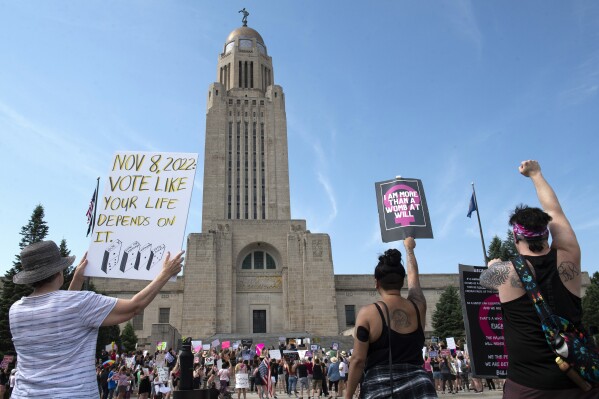 FILE - Protesters line the street around the front of the Nebraska State Capitol during an Abortion Rights Rally held on July 4, 2022, in Lincoln, Neb. Jessica Burgess, a Nebraska mother who pleaded guilty to giving her teenage daughter pills for an abortion and helping to burn and conceal the fetus, was sentenced Friday, Sept. 22, 2023, to two years in prison., (Kenneth Ferriera/Lincoln Journal Star via AP, File)