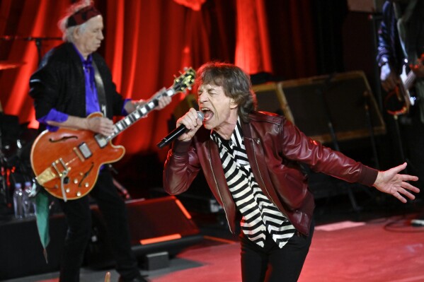 Mick Jagger, right, and Keith Richards of The Rolling Stones perform during a celebration for the release of their new album "Hackney Diamonds" on Thursday, Oct. 19, 2023, in New York. (Photo by Evan Agostini/Invision/AP)
