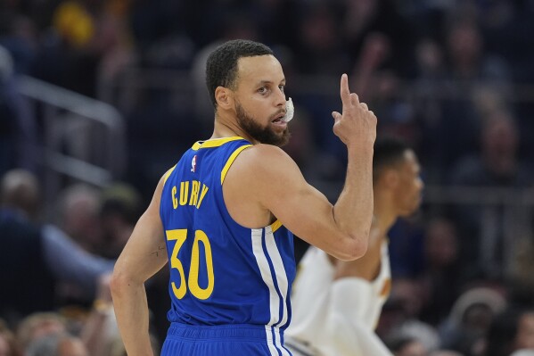 Warriors' Stephen Curry sits out game against the Bucks due to 'mental and emotional fatigue' | AP News