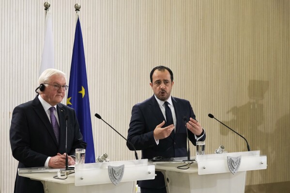 Cyprus' President Nikos Christodoulides, right, and German President Frank-Walter Steinmeier talk to the media during a press conference after their meeting at the Presidential palace in capital Nicosia, Cyprus, Monday, Feb. 12, 2024. Steinmeier is in island of Cyprus for official visit. Steinmeier is the first president of Germany to visit Cyprus since the two countries established diplomatic relations when the east Mediterranean island gained independence from British colonial rule in 1960. (AP Photo/Petros Karadjias, Pool)