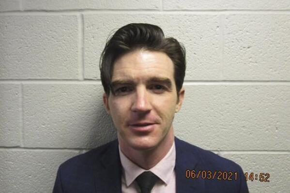 This June 3, 2021 photo provided by Cuyahoga County Sheriffs Office shows Jared Bell. Bell is charged with attempted endangering children and a misdemeanor child pornography charge involving a 15-year-old girl, according to court records. (Cuyahoga County Sheriffs Office via AP)