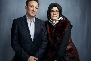 FILE - Director Bryan Fogel, left, and Hatice Cengiz pose for a portrait to promote "The Dissident," a film about slain journalist Jamal Khashoggi, during the Sundance Film Festival in Park City, Utah on Jan. 24, 2020. (Photo by Taylor Jewell/Invision/AP, File)