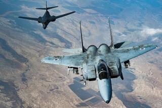 In this photo released by the U.S. Air Force, an Israeli Air Force F-15 Strike Eagle flies in formation with a U.S. Air Force B-1B Lancer over Israel as part of a deterrence flight Saturday, Oct. 30, 2021. The U.S. Air Force said Sunday it flew a B-1B strategic bomber over key maritime chokepoints in the Mideast with allies including Israel amid ongoing tensions with Iran as its nuclear deal with world powers remains in tatters. (U.S. Air Force/Senior Airman Jerreht Harris via AP)