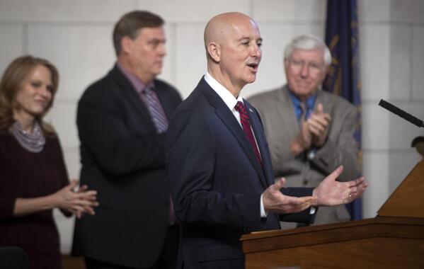 Nebraska Gov. Pete Ricketts delivers his annual State of the State address at the Nebraska State Capitol, Thursday, Jan. 13, 2022, in Lincoln, Neb. (Justin Wan/Lincoln Journal Star via AP)