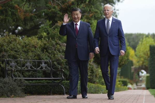 President Joe Biden and China's President President Xi Jinping walk in the gardens at the Filoli Estate in Woodside, Calif., Wednesday, Nov, 15, 2023, on the sidelines of the Asia-Pacific Economic Cooperative conference. (Doug Mills/The New York Times via AP, Pool)