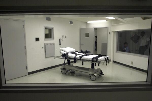 FILE- Alabama's lethal injection chamber at the Holman Correctional Facility in Atmore, Ala., is pictured, Oct. 7, 2002. Alabama Gov. Kay Ivey said Friday, Feb. 24, 2023, that the state is ready to resume executions and “obtain justice” for victims' families after lethal injections were paused for three months for an internal review of the state's death penalty procedures. (AP Photo/Dave Martin, File)