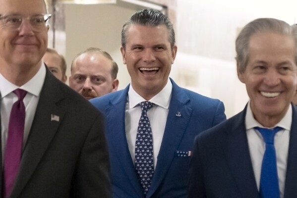 Pete Hegseth, President-elect Donald Trump's choice to be defense secretary, arrives for a meeting with Sen. Susan Collins, R-Maine, on Capitol Hill, Wednesday, Dec. 11, 2024, in Washington. (AP Photo/Mark Schiefelbein)