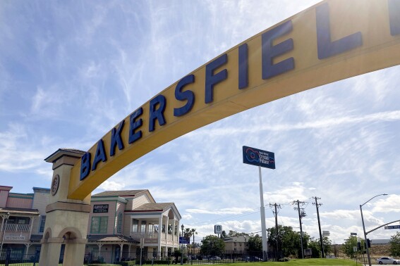 FILE - A sign for Bakersfield, Calif., is displayed over Sillect Avenue at Buck Owens Boulevard on April 20, 2022. Voters in California's 20th Congressional District can be forgiven if they open their ballots for Tuesday's election with a sense of déjà vu. Since former House Speaker Kevin McCarthy announced in December he would step down from his Central Valley seat, voters have already had two opportunities to vote for candidates to complete McCarthy's term and serve the next full one. (AP Photo/Lisa Mascaro)