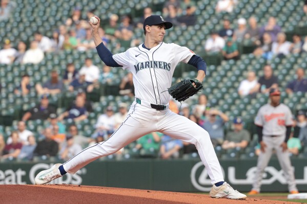 Seattle Mariners starting pitcher George Kirby throws during the first inning of a baseball game against the Baltimore Orioles, Tuesday, June 3, 2025, in Seattle. (AP Photo/Jason Redmond)