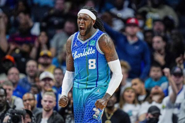 FILE - Charlotte Hornets center Montrezl Harrell reacts after a play during the second half of the team's NBA basketball game against the Dallas Mavericks on Saturday, March 19, 2022, in Charlotte, N.C. The Philadelphia 76ers have agreed to a two-year contract with free-agent center Harrell in a move that will reunite him with coach Doc Rivers, a person familiar with the deal told The Associated Press. The person spoke on condition of anonymity Tuesday, Sept. 6, 2022 because the deal has not been officially announced.(AP Photo/Rusty Jones, File)
