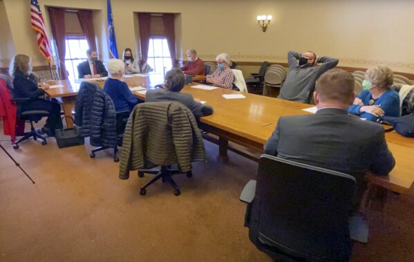 This image from video made by Kenneth Chesebro and provided by Georgetown University Law Center's Institute for Constitutional Advocacy and Protection, Law Forward and Stafford Rosenbaum, shows the fake electors meeting at the Wisconsin Capitol in Madison, Wis., on Dec. 14, 2020. (Georgetown University Law Center's Institute for Constitutional Advocacy and Protection, Law Forward and Stafford Rosenbaum via AP)