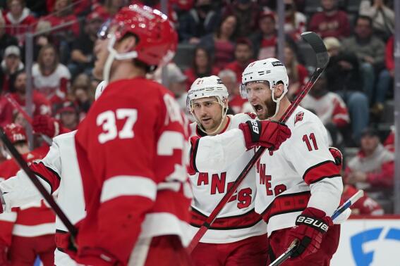 Carolina Hurricanes center Jordan Staal (11) celebrates his goal against the Detroit Red Wings in the third period of an NHL hockey game Tuesday, March 1, 2022, in Detroit. (AP Photo/Paul Sancya)