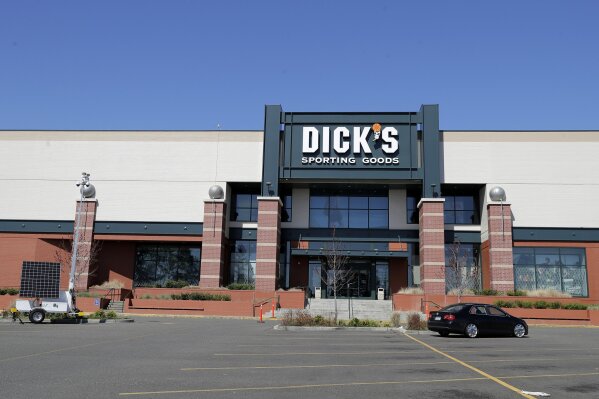 A closed Dick's Sporting Goods store is shown, Thursday, April 9, 2020, at a mall in Tacoma, Wash. More than 170,000 people filed new claims for unemployment benefits in Washington state last week, officials said Thursday, bringing the total number of initial claims filed in the state to nearly half a million since mid-March, when businesses started closing or limiting operations due to the coronavirus outbreak. Dick's announced Thursday that they would be putting most of their employees on furlough starting Sunday due to closed stores and the outbreak of the coronavirus. (AP Photo/Ted S. Warren)