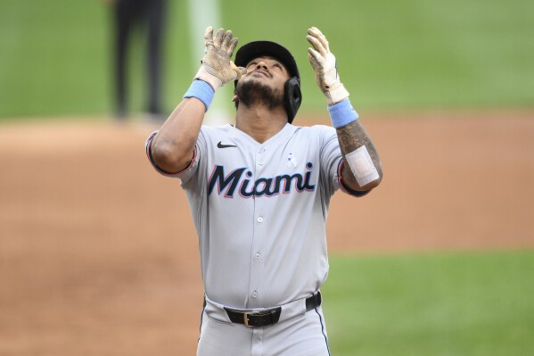 Miami Marlins' Dane Myers celebrates after his home run during the second inning of a baseball game against the Washington Nationals, Sunday, June 15, 2025, in Washington. (AP Photo/Nick Wass)