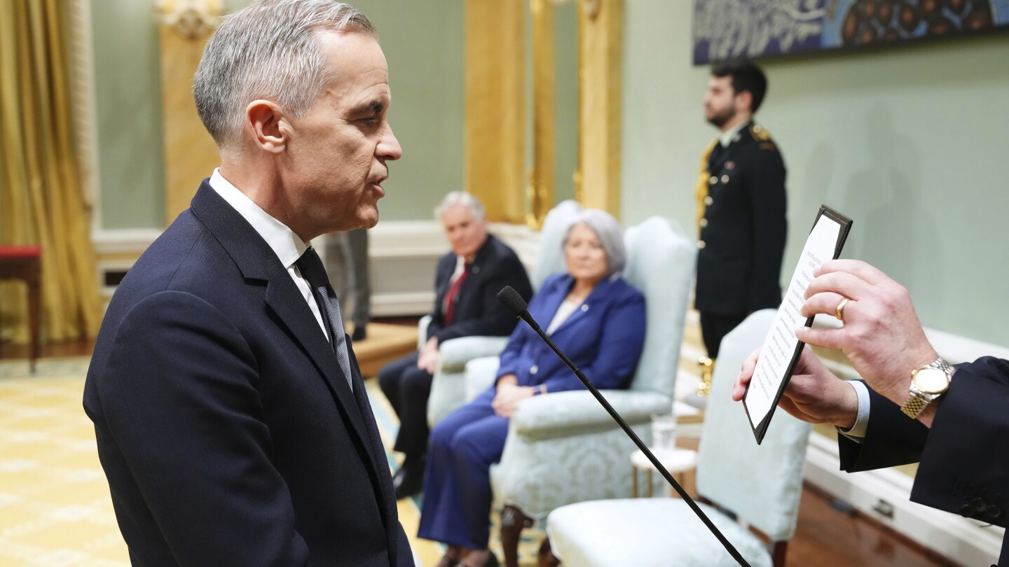 Mark Carney is sworn in as Canada's new prime minister as country deals with Trump's trade war