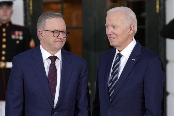 President Joe Biden and Australia's Prime Minister Anthony Albanese pose for photos at the White House Tuesday, Oct. 24, 2023. (AP Photo/Manuel Balce Ceneta)