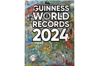 This image shows cover art for the latest edition of the Guinness World Records. The 2024 edition has taken our watery world as its theme. That means there's entries for the largest octopuses, largest hot spring and deepest shark among the 2,638 achievements. (Guinness World Records via AP)
